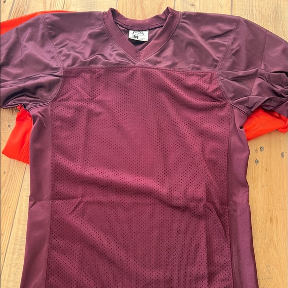 Bundle of practice football gear.  4 practice jerseys, 4 black socks & chinstrap - Picture 6 of 7